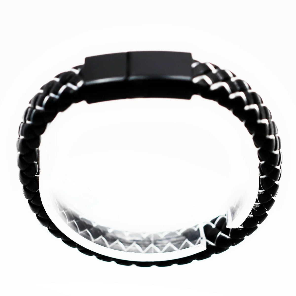 Black and white woven bracelet with a clasp.