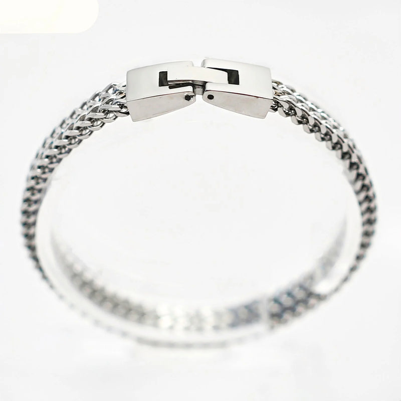 Silver chain bracelet with a rectangular clasp.